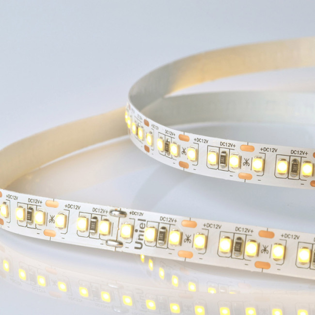 Светодиодная лента Uniel ULS-M14-2835-168LED/m-10mm-IP20-DC12V-14W/m-5M-3000K PROFI катушка в герметичной упаковке Светодиодная лента Uniel ULS-M14-2835-168LED/m-10mm-IP20-DC12V-14W/m-5M-3000K PROFI катушка в герметичной упаковке